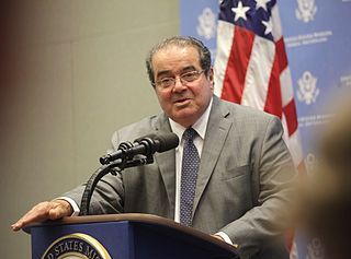  photo 320px-Justice_Antonin_Scalia_Speaks_with_Staff_at_the_US_Mission_in_Geneva_2_zps3f607651.jpg